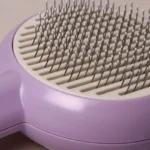برس-مو-سگ-و-گربه-مدل-تخلیه-دار-طرح-گل‌2